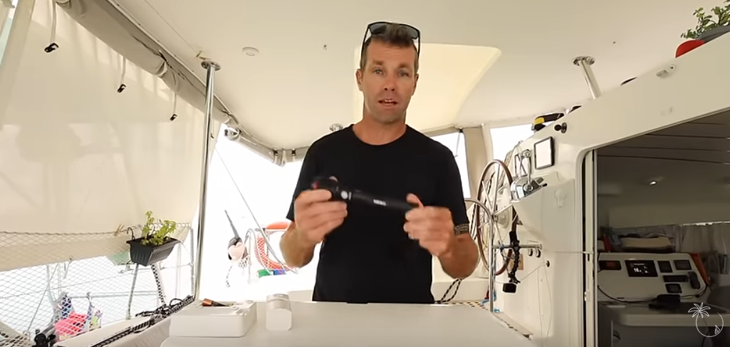 Ben showing the NEBO flashlight. He is an influencer Sailing Naho YouTube Channel.